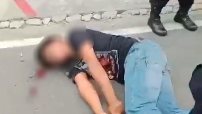 Video viral pria disebut dipukul polisi hingga berdarah di Medan. (Istimewa)
