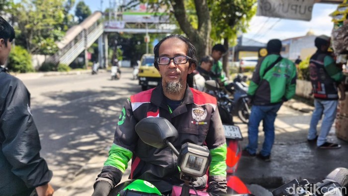 Wa Amif, driver ojek online di Bandung.
