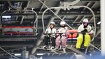 Warga Shanghai Serbu Dunia Salju Buatan Saat Suhu Panas Mencapai Rekor