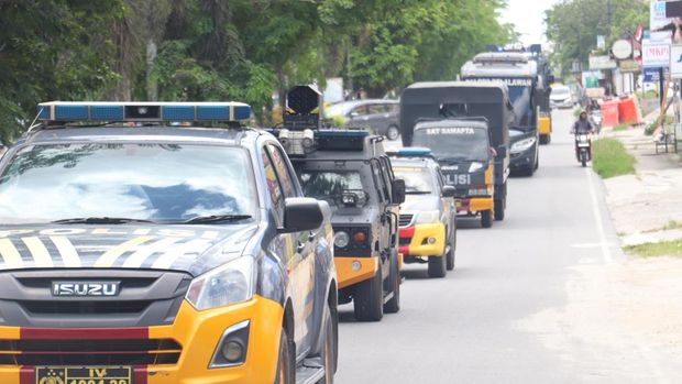 Polres Pelalawan menggelar patroli skala besar demi menciptakan rasa aman.