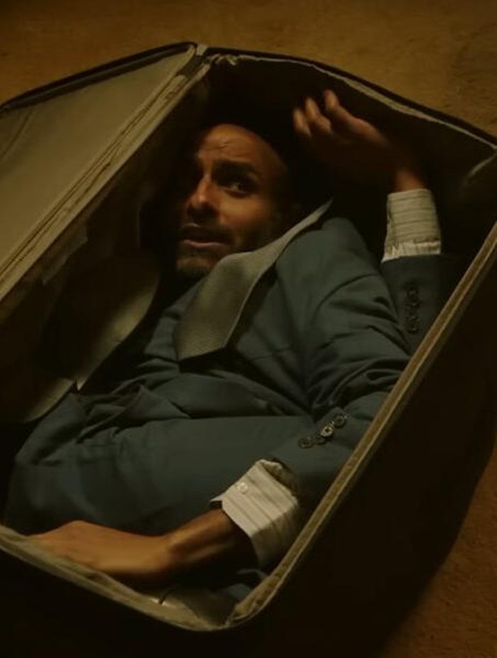 The Man In the Suitcase The Man In the Suitcase