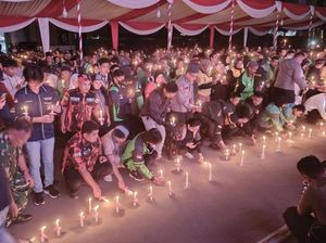 Polisi Bersama Ojol di Jambi Gelar Aksi Damai 1000 Lilin