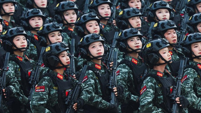VIETNAM-INDEPENDENCEDAY/PARADE Vietnamese troops march during a parade celebrating the 80th anniversary of independence in Hanoi, Vietnam, September 2, 2025. REUTERS/Athit Perawongmetha/Pool