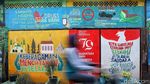 Keren Abis! Lorong Sempit Jakarta Disulap Jadi Galeri Mural Penuh Pesan Sosial