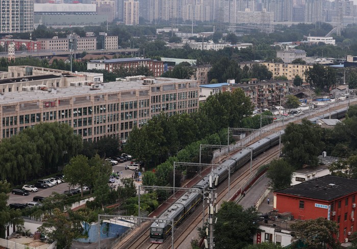 A North Korean flag flutters from a train believed to be carrying North Korean leader Kim Jong Un, as it arrives in Beijing, China, September 2, 2025. The North Korean leader is expected to attend a military parade in Beijing on Wednesday to mark the 80th anniversary of the end of World War Two. REUTERS/Go Nakamura      TPX IMAGES OF THE DAY