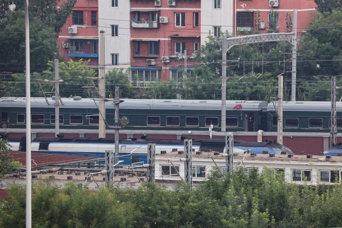 A North Korean flag flutters from a train believed to be carrying North Korean leader Kim Jong Un, as it arrives in Beijing, China, September 2, 2025. The North Korean leader is expected to attend a military parade in Beijing on Wednesday to mark the 80th anniversary of the end of World War Two. REUTERS/Go Nakamura      TPX IMAGES OF THE DAY