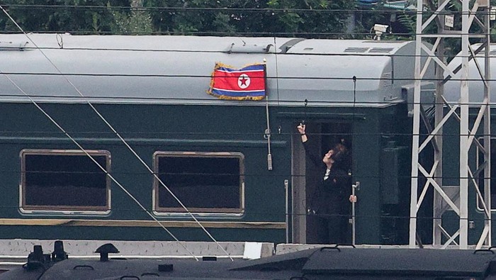 A North Korean flag flutters from a train believed to be carrying North Korean leader Kim Jong Un, as it arrives in Beijing, China, September 2, 2025. The North Korean leader is expected to attend a military parade in Beijing on Wednesday to mark the 80th anniversary of the end of World War Two. REUTERS/Go Nakamura      TPX IMAGES OF THE DAY