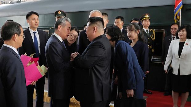 This photo provided by the North Korean government, North Korean leader Kim Jong Un, center, is greeted by Chinese Foreign Minister Wang Yi on his arrival at a station in Beijing, China, Tuesday, Sept. 2, 2025. Independent journalists were not given access to cover the event depicted in this image distributed by the North Korean government. The content of this image is as provided and cannot be independently verified. (Korean Central News Agency/Korea News Service via AP)