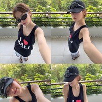 Seulgi Red Velvet memamerkan sederet fotonya usai liburan musim panas ke Pulau Dewata. Personel grup KPop Red Velvet itu langsung menarik perhatian karena tampak memakai kaos singlet hitam bertuliskan “I Love Bali.” Foto: dok. Instagram @hi_sseulgi