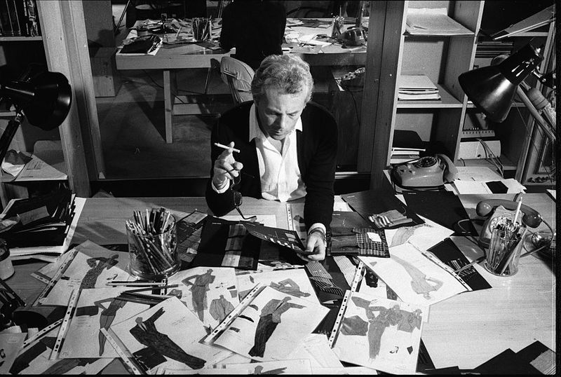 Italian fashion designer Giorgio Armani (1934 - 2025), examines drawings for new designs, late 1970s. (Photo by David Lees/Corbis/VCG via Getty Images)