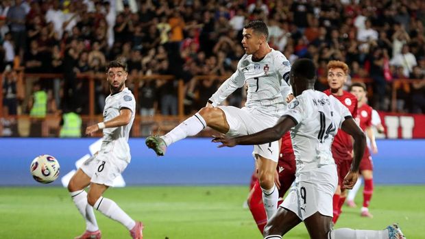 Armenia vs Portugal Soccer Football - World Cup - UEFA Qualifiers - Group F - Armenia v Portugal - Vazgen Sargsyan Republican Stadium, Yerevan, Armenia - September 6, 2025 Portugal's Cristiano Ronaldo scores their second goal Photolure via REUTERS/Hayk Baghdasaryan