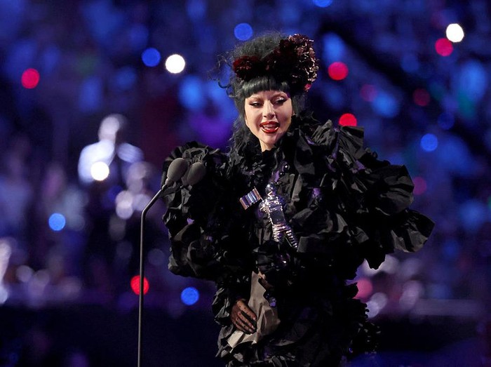 ELMONT, NEW YORK - SEPTEMBER 07: Lady Gaga accepts the “Artist of the Year” award onstage during the 2025 MTV Video Music Awards at UBS Arena on September 07, 2025 in Elmont, New York. (Photo by Kevin Kane/Getty Images)