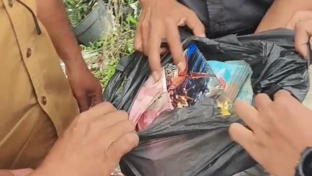 Penampakan uang hasil korupsi yang sempat dibawa Kabid Badan Kesbangpol Buton Tengah saat terjaring OTT.