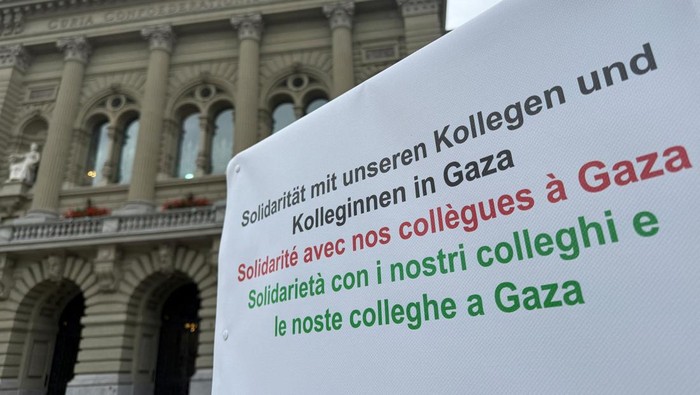 Doctors Michele Ghielmini, Brenno Balestra, Alessandra Guaita and Marco Franzi sit outside the Swiss Parliament building (Bundeshaus) at the start of their hunger strike over Gaza, calling on their government to apply targeted sanctions on Israel over its alleged violations of international law and to recognise a Palestinian state, in Bern, Switzerland, September 8, 2025.  REUTERS/Cecile Mantovani