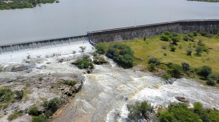 A drone view shows controlled venting being carried out at the Centenario Dam as water levels exceed capacity following heavy rains, in Tequisquiapan, Queretaro state, Mexico, September 8, 2025. REUTERS/Demian Sanchez