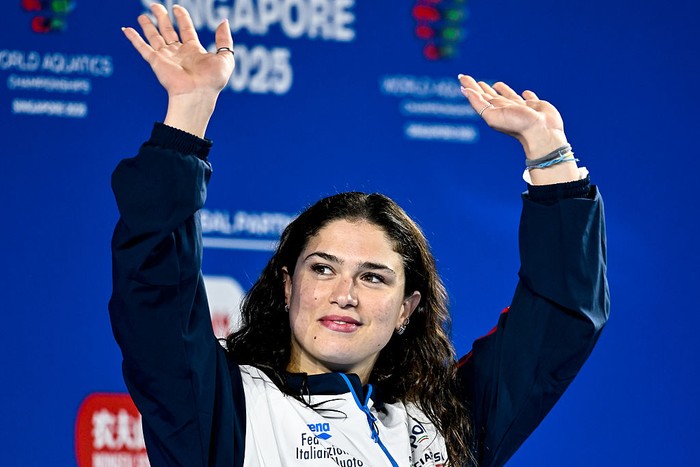 Benedetta Pilato of Italy celebrates after winning the bronze medal in the swimming 50m Breaststroke Women Final during the 22nd World Aquatics Championships at the WAC Arena in Singapore (Singapore), August 3, 2025 (Photo by DBM/Insidefoto/Mondadori Portfolio via Getty Images)