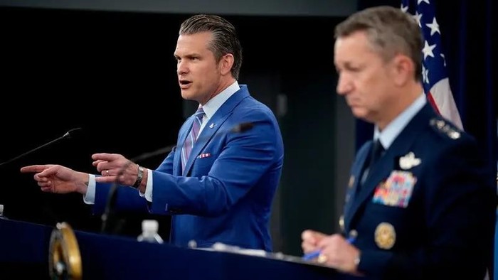 US Defense Secretary Pete Hegseth (L), accompanied by Chairman of the Joint Chiefs of Staff Air Force Gen. Dan Caine (R), speaks during a news conference at the Pentagon on June 26, 2025. (AFP)
