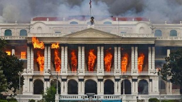 Fire rages through the Singha Durbar, the main administrative building for the Nepal government, in Kathmandu on September 9, 2025, a day after a police crackdown on demonstrations over social media prohibitions and corruption by the government. Nepali youth protesters set fire to parliament on September 9 as the veteran prime minister obeyed furious crowds to quit, a day after one of the deadliest crackdowns in years in which at least 19 people were killed. (Photo by Prabin RANABHAT / AFP) / The erroneous mention[s] appearing in the metadata of this photo by Anup OJHA has been modified in AFP systems in the following manner: [Byline - Prabin RANABHAT] instead of [Byline - Anup OJHA]. Please immediately remove the erroneous mention[s] from all your online services and delete it (them) from your servers. If you have been authorized by AFP to distribute it (them) to third parties, please ensure that the same actions are carried out by them. Failure to promptly comply with these instructions will entail liability on your part for any continued or post notification usage. Therefore we thank you very much for all your attention and prompt action. We are sorry for the inconvenience this notification may cause and remain at your disposal for any further information you may require.