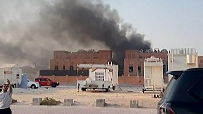 This frame grab taken from an AFPTV footage shows smoke billowing after explosions in Qatars capital Doha on September 9, 2025. Israels military said it carried out air strikes on September 9 targeting senior Hamas leaders in the Qatari capital Doha, the venue of multiple rounds of talks aimed at ending the Gaza war. (Photo by Jacqueline PENNEY / AFPTV / AFP)