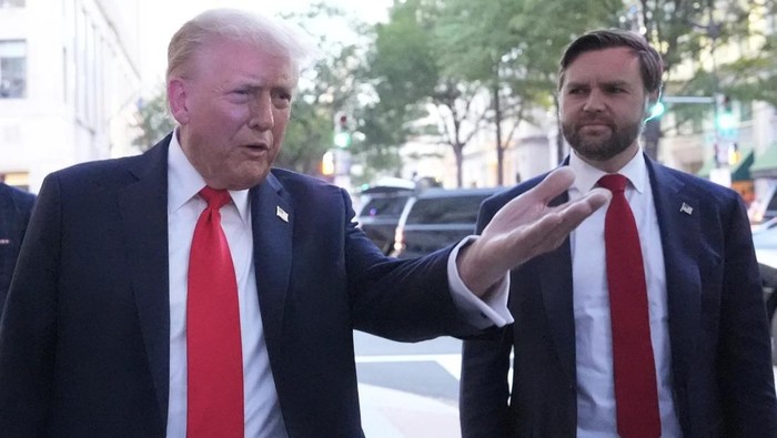 President Donald Trump speaks to reporters before he enters a restaurant near the White House, Tuesday, Sept. 9, 2025, in Washington, to have dinner Vice President JD Vance. (AP Photo/Alex Brandon)
