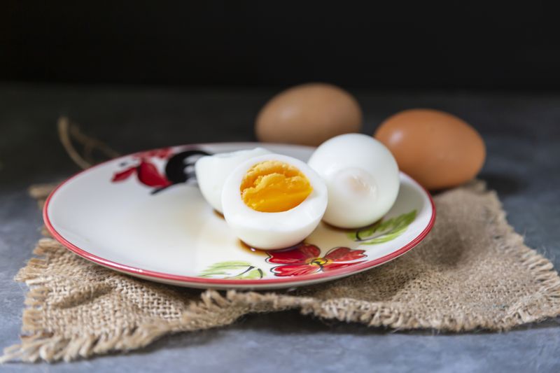 Boiled eggs are placed in a serving dish.