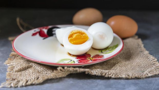 Boiled eggs are placed in a serving dish.