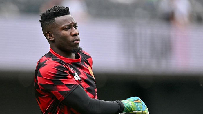 LONDON, ENGLAND - AUGUST 24: Andre Onana of Manchester United warms up before the Premier League match between Fulham and Manchester United at Craven Cottage on August 24, 2025 in London, England. (Photo by Vince Mignott/MB Media/Getty Images)
