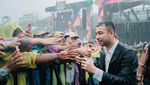 Potret Raffi Ahmad Hujan-hujanan Bareng 15 Ribuan Pramuka Muslim Sedunia di Cibubur