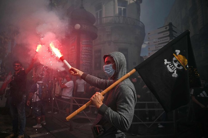 A protester waving a pirate flag during a demonstration in Montpellier, France, on Sept 10.

PHOTO: AFP