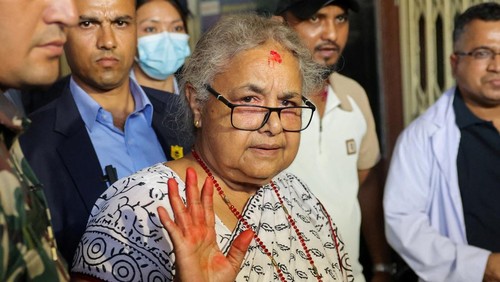 Newly sworn-in  Nepal’s interim Prime Minister, Sushila Karki, arrives at a hospital to meet the victims of Monday’s deadly anti-corruption protests, in Kathmandu, Nepal, September 13, 2025. REUTERS/Adnan Abidi