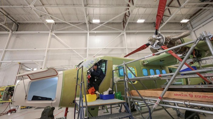 A technician works in one of the facilities of De Havilland Canada, as the company produces the Canadair 515 water-bomber to combat wildfires, in Calgary, Alberta, Canada, August 22, 2025. REUTERS/Ahmed Zakot