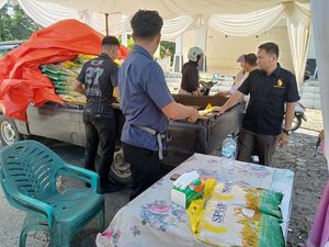 Jaga Stabilitas Harga Pangan, Polres Rohul Salurkan 2 Ton Beras Murah