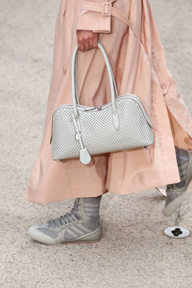 PARIS, FRANCE - SEPTEMBER 30: (EDITORIAL USE ONLY - For Non-Editorial use please seek approval from Fashion House) A model, bag and shoe details, walks the runway during the Stella McCartney Paris Womenswear Spring-Summer 2025 show as part of Paris Fashion Week on September 30, 2024 in Paris, France. (Photo by Peter White/Getty Images)