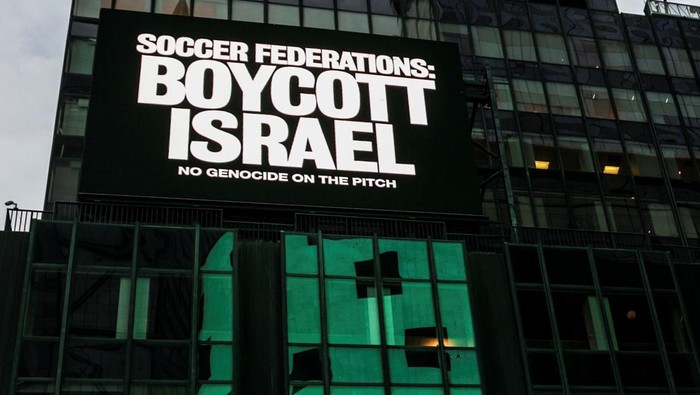 A billboard in Times Square displays the message 