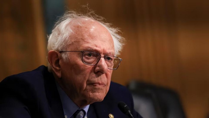 U.S. Senator Bernie Sanders (I-VT) listens as U.S. Trade Representative Jamieson Greer testifies before a Senate Finance Committee hearing on U.S. President Donald Trumps trade policy, on Capitol Hill in Washington, D.C., U.S., April 8, 2025. REUTERS/Kevin Mohatt/File Photo Purchase Licensing Rights