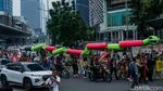 Ular Raksasa Warnai Aksi Tuntut Keadilan Iklim dan Energi Bersih di Jakarta
