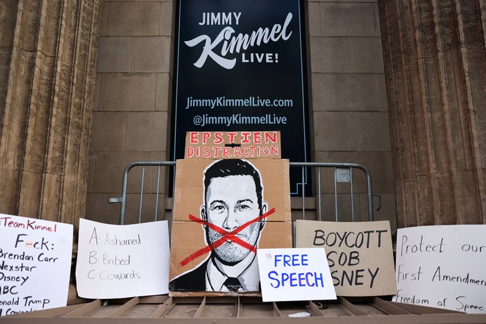 Signs are arranged during a protest at the El Capitan Entertainment Centre, where 