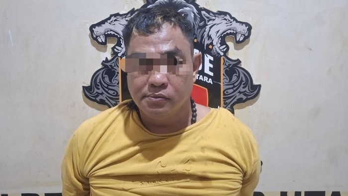 Pria yang memalak sopir truk saat diamankan polisi