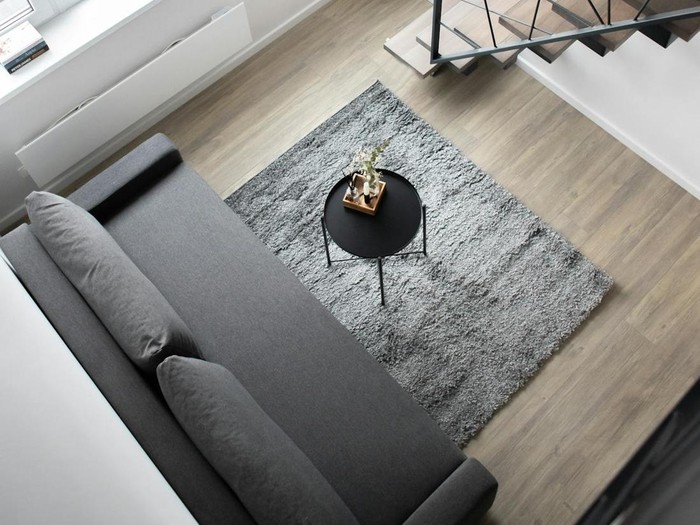 Ilustrasi karpet di ruang tamu.