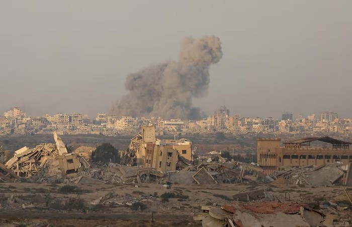 Smoke rises following an Israeli strike amid an Israeli operation, as seen from central Gaza Strip, September 21, 2025.