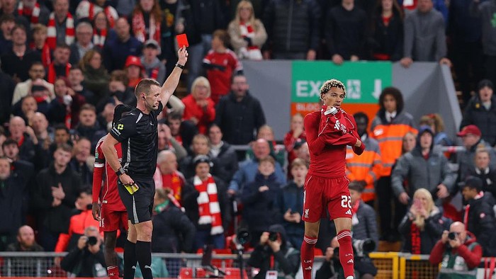 LIVERPOOL, ENGLAND - SEPTEMBER 23: Hugo Ekitike of Liverpool is shown a red card after scoring their sides second goal during the Carabao Cup Third Round match between Liverpool and Southampton at Anfield on September 23, 2025 in Liverpool, England. (Photo by James Gill - Danehouse/Getty Images)