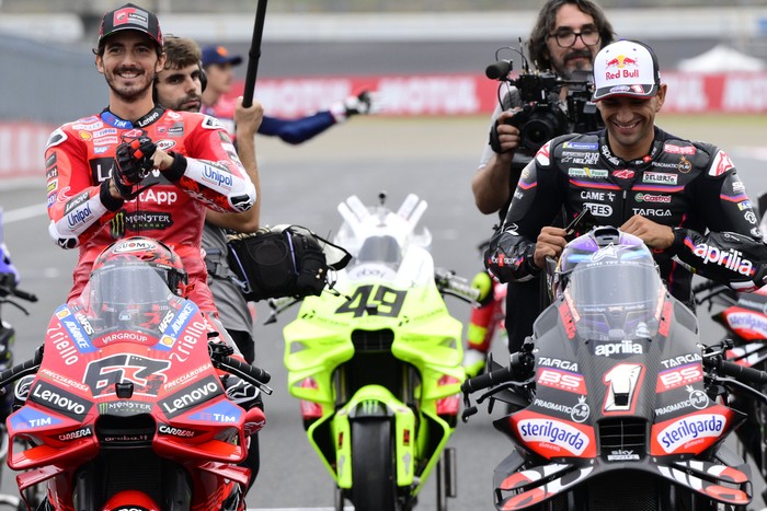 MOTEGI, JAPAN - SEPTEMBER 25: Jorge Martin of Spain riding an Aprilia Racing and Francesco Bagnaia of Italy riding a Ducati Lenovo Team during the group photo ahead of the MotoGP of Japan at Twin Ring Motegi on September 25, 2025 in Motegi, Japan. (Photo by Gold & Goose Photography/Getty Images)