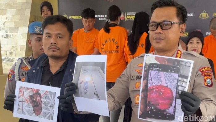 Kapolresta Kendari Kombes Edwin L. Sengka saat memperlihatkan gambar janin yang diungkap dari sindikat aborsi.
