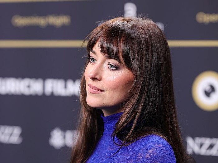 ZURICH, SWITZERLAND - SEPTEMBER 25: (EDITORS NOTE: Image contains nudity.) Dakota Johnson poses at the Opening Green Carpet for the 21st Zurich Film Festival at Kongresshaus on September 25, 2025 in Zurich, Switzerland. (Photo by Joshua Sammer/Getty Images)