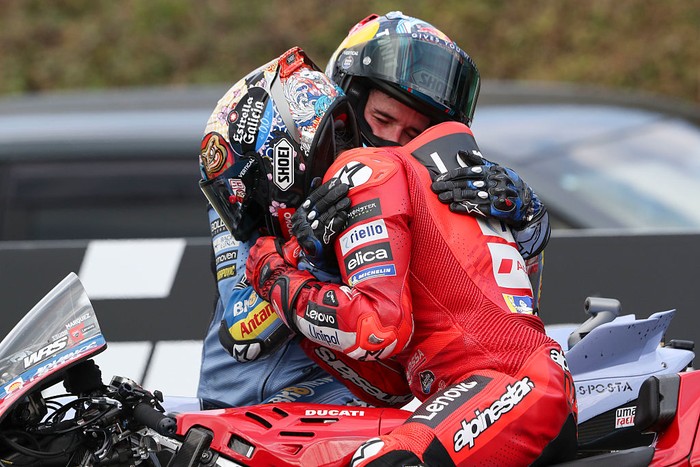 MOTEGI, JAPAN - SEPTEMBER 28: Alex Marquez of Spain riding the BK8 Gresini Racing Ducati (73) congratulates Marc Marquez of Spain riding the Lenovo Ducati (93) on winning the World Championship during the MotoGP of Japan race at Twin Ring Motegi on September 28, 2025 in Motegi, Japan. (Photo by Gold & Goose Photography/Getty Images)