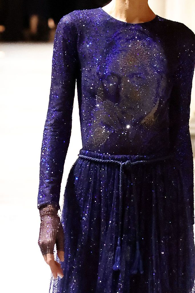 MILAN, ITALY - SEPTEMBER 28: A model walks the runway at the Giorgio Armani fashion show during the Milan Womenswear Spring/Summer 2026 on September 28, 2025 in Milan, Italy. (Photo by Daniele Venturelli/WireImage)
