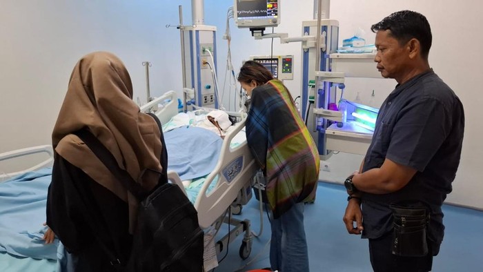 Korban saat dirawat di RSUD Arifin Achmad Pekanbaru. (Dok Polres Inhu)