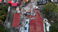 Melansir Reuters, Kamis (2/10), gempa bumi dahsyat yang melanda provinsi Cebu di Filipina tengah pada Selasa malam telah menewaskan sedikitnya 72 orang dan melukai 200 orang, menurut Kantor Pertahanan Sipil Filipina (OCD). Foto: REUTERS/Adrian Portugal