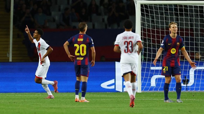 Soccer Football - UEFA Champions League - FC Barcelona v Paris St Germain - Estadi Olimpic Lluis Companys, Barcelona, Spain - October 1, 2025 Paris St Germains Senny Mayulu celebrates scoring their first goal REUTERS/Albert Gea