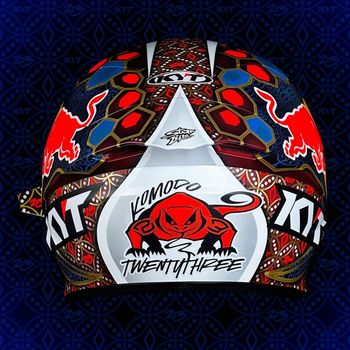 Helm pembalap Enea Bastianini bermotif batik dan komodo